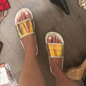 BCBGeneration Gold and White Sandals with Modern Design